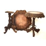Late 19th/early 20th Century Indian carved hardwood occasional table, the circular top with carved