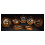 Collection of seven 19th Century Pratt ware pot lids including; Peace, Uncle Toby, Landing The