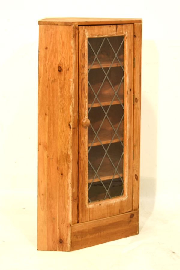 Yellow pine corner cabinet with glazed leaded tracery door Condition: