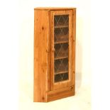 Yellow pine corner cabinet with glazed leaded tracery door Condition: