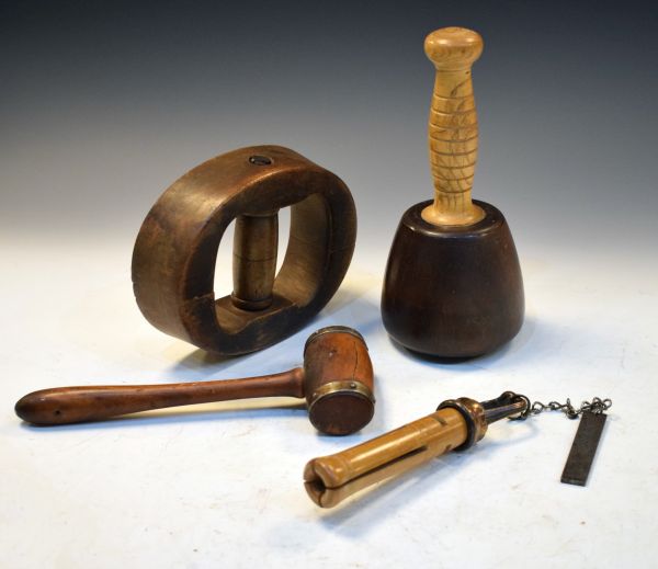 Four items of treen comprising: a snooker/billiards cue-tipper RD.658062, a lignum vitae and elm