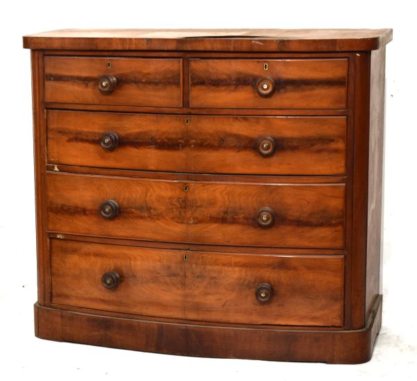 19th Century mahogany veneered bowfront chest of two short over three long drawers on plinth base,