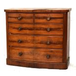 19th Century mahogany veneered bowfront chest of two short over three long drawers on plinth base,
