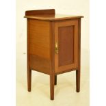 Early 20th Century inlaid mahogany bedside cabinet or pot cupboard with panelled door enclosing