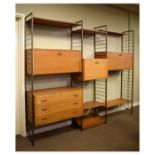 Quantity of Staples Ladderax teak modular furniture comprising: six gold finish metal uprights and a