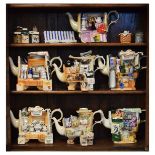 Seven Cardew Designs collectors teapots formed as market stalls Condition: