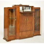 1950's period walnut veneered cocktail/display cabinet fitted central fall flap, drawer, cupboards
