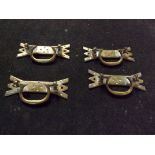 A set of 4 late Victorian brass drawer h