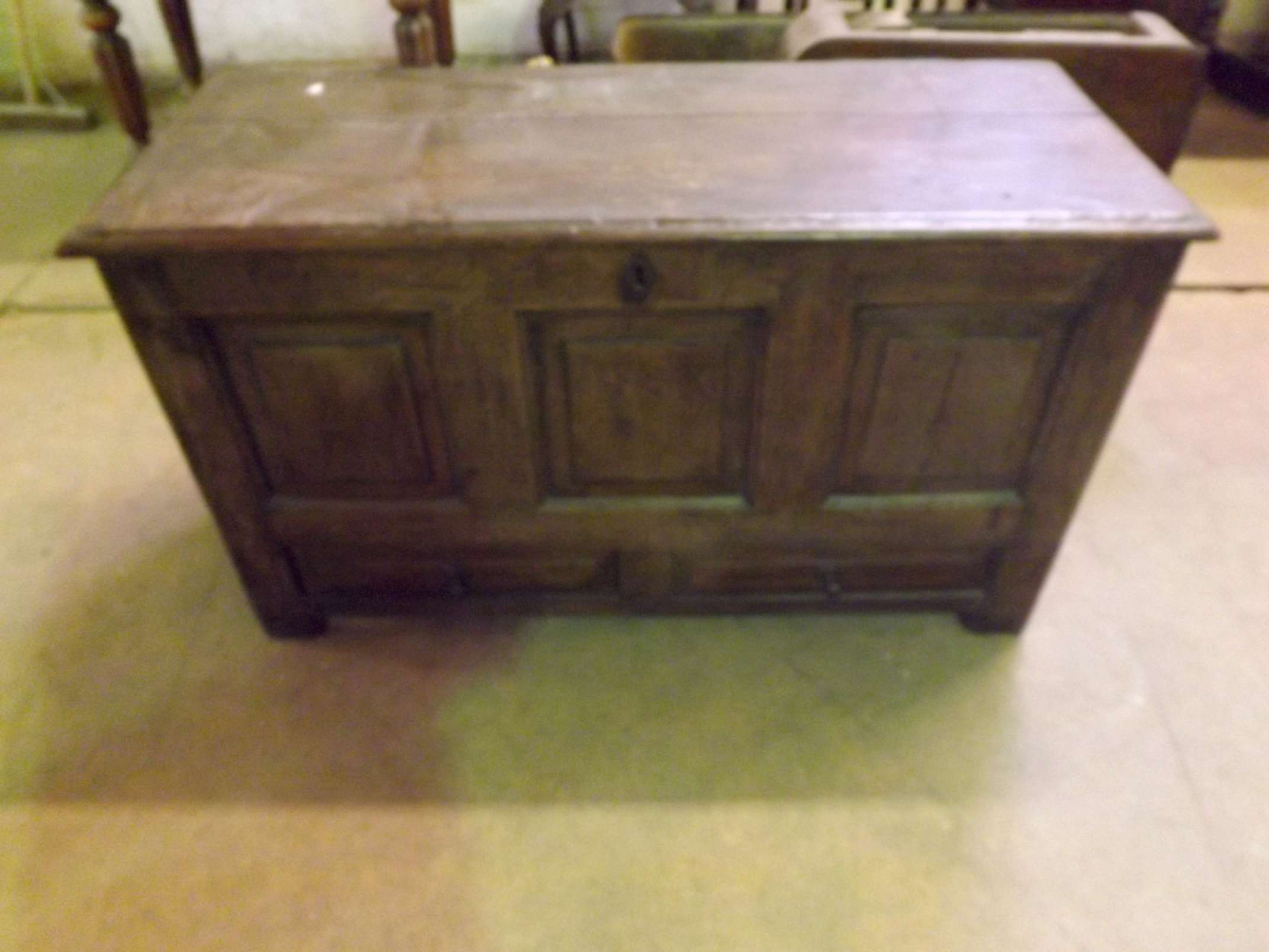 An 18th century oak plank top coffer wit