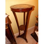 A Regency torchiere in rosewood with ins