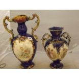 TWO CONTINENTAL VASES WITH DECORATIVE PANELS ON A BLUE GROUND