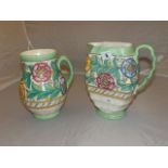 TWO CROWN DUCAL WATER JUGS OF SIMILAR DESIGN 9" TALL