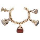 14kt rose gold charms bracelet England, late 19th century peso 88 gr.