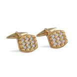 18kt gold and diamond cuff links peso 12 gr.