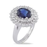 18kt white gold ring with sapphire peso 9 gr.