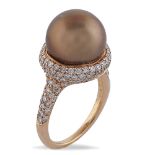 18kt rose gold ring with gold pearl peso 9 gr.