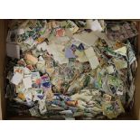 WORLD STAMPS (8kg) off paper - mixture in a carton.