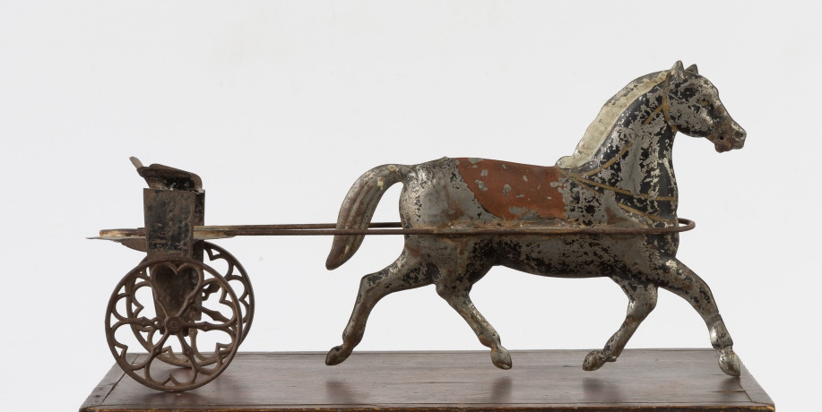 Painted Tin Horse Drawn Cart. 19th century. Heart shaped wheels . Wear to paint . L 15" Ht. 7". A