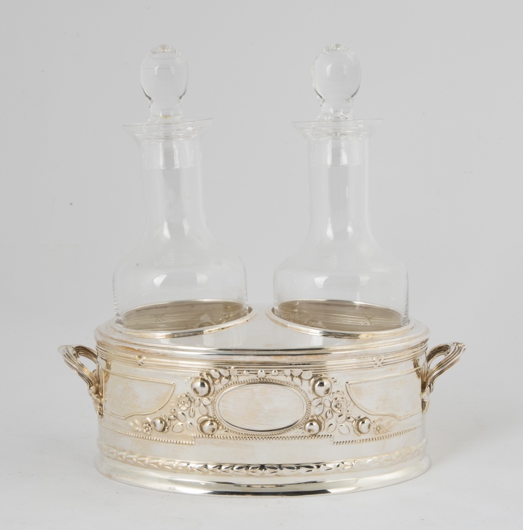 Camuso? Peru Sterling Silver Cruet Set. With repousse flowers. 16.6 ozt . Ht. 8 1/2" W 8". Online