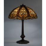 Leaded Glass Table Lamp. With bronze base . Several cracked panels . Ht. 27" Shade Dia. 20".