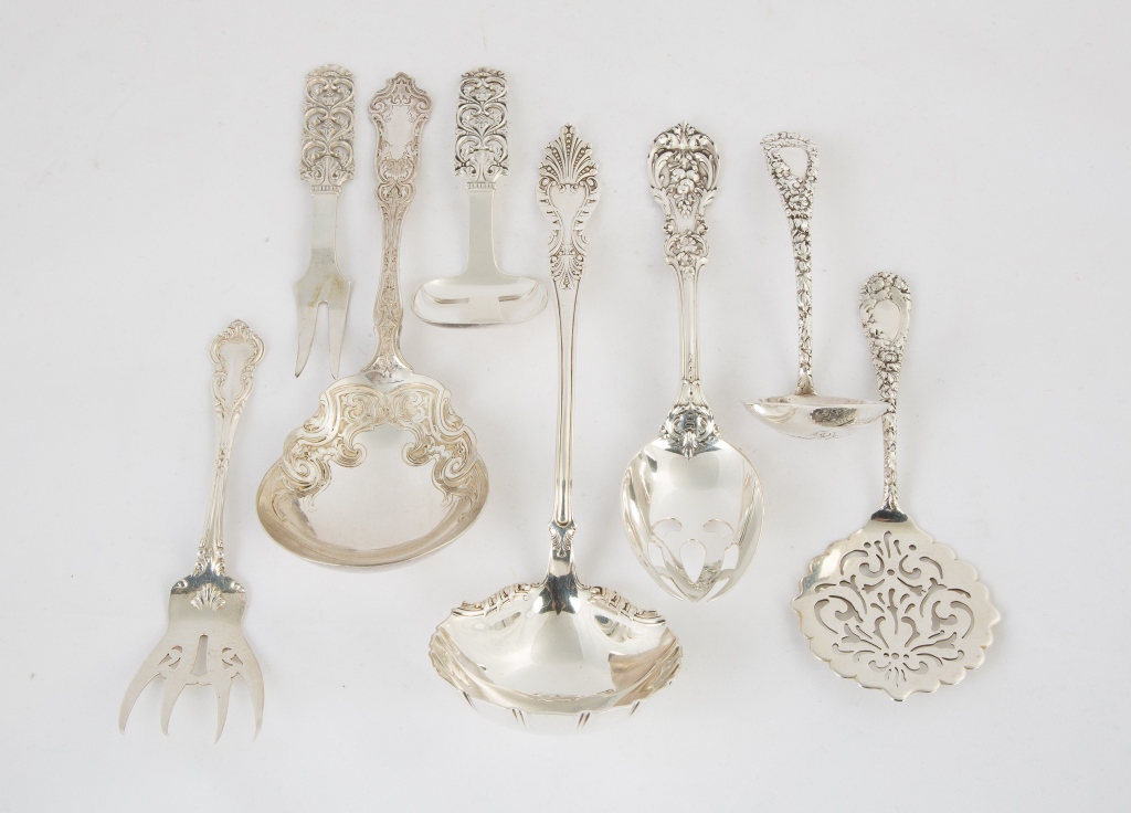 Eight Various Sterling Silver Serving Pieces. 16.9 ozt . . Max. L 10" . Online bidding available: