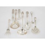 Eight Various Sterling Silver Serving Pieces. 16.9 ozt . . Max. L 10" . Online bidding available: