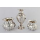 Three Buccellati Sterling Silver Vases. 29 ozt . Max. Ht. 9". Online bidding available: https://