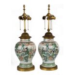 Pair of Chinese Painted Porcelain Vases. Double circle mark. Gilt bronze mounts . Converted to lamps