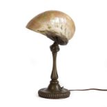Tiffany Studios Nautilus Shell Desk Lamp. Early 20th century. Adjustable bronze ribbed base,