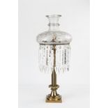 Sinumbra Lamp on a Gilt Bronze Base. 19th century. Period cut glass shade and prisms . Converted