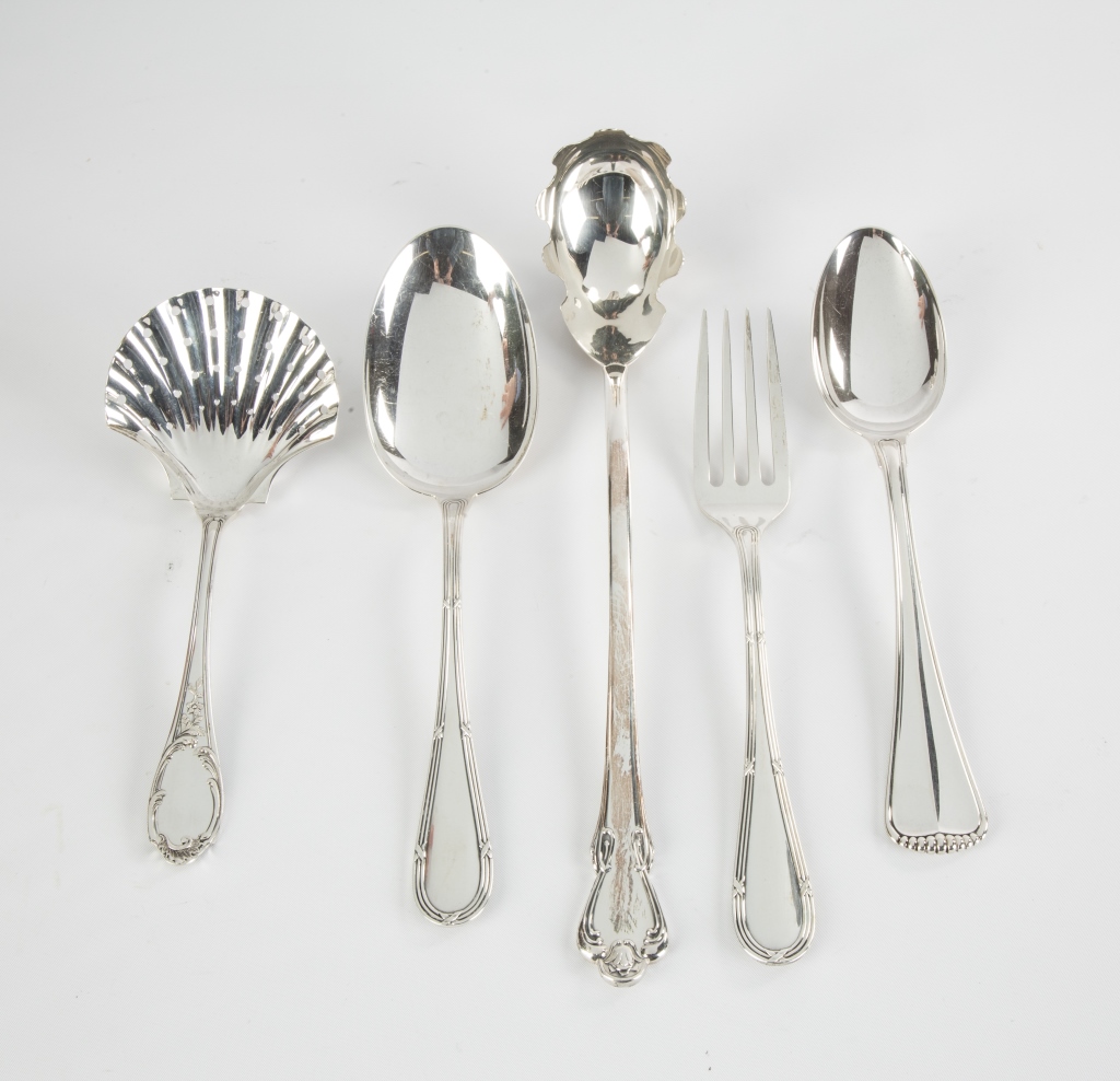 Five Sterling Silver Serving Pieces. 23 ozt. Four Buccellati; one Camusso, Peru . Max. L 13 1/2".