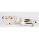 Two Buccellati Sterling Silver Footed Bowls. L: Ht. 4 1/2" W 8 1/2" D 6 1/2' R: Ht. 3 1/4" W 10 1/2"