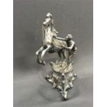 A Spelter figure of a horse and boy on stand.