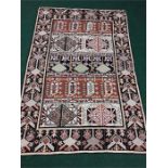 A handmade chain stitch rug 70 x 48