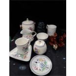 Seven Traditional Poole Pottery pattern items, commemorative cup with three brown Poole Pottery