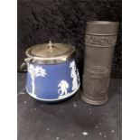 Wedgewood, two early pieces pre 1920's of Jasperware black basalt 8" cylinder and a blue biscuit