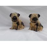 Two ceramic Pugs.