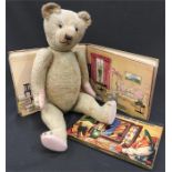 Mohair teddy bear with long snout, stitched nose and mouth, four claws to each paw, disc joints,