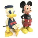 Two Marx (Hong Kong) Disney Mickey Mouse and Donald Duck Twirly Tail Toys: hard plastic clockwork