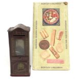 Early 20th century Pascall Ambrosia Milk Chocolate tinplate savings bank, made in Germany, in maroon