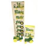 ERTL John Deere Gift Set comprising seven 1/64 scale Tractors: 1892 Froelich Tractor; 1914