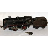 A BUB KRAUS FANDOR 0 Gauge Black lined Red 0-4-0 and Tender - the Locomotive has an Excellent C/W