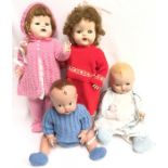 Four dolls: Pedigree composition doll with painted features and side-glancing blue eyes, height