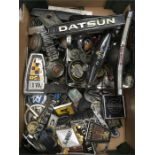 Quantity of assorted car badges, hub caps and fittings, includes Toyota, Peugeot and Mini. Ages