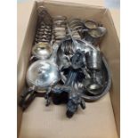 A box of assorted silver plate, sugar, cream, ladle, etc.