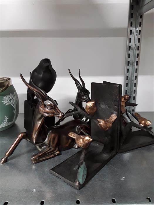 A small quantity of metal collectables, bird bookends etc.