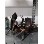 A small quantity of metal collectables, bird bookends etc.
