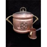 A German jungstyle Arts and Crafts copper ice bucket (over polished) with a small copper tankard.