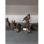 Seven BLA brown Poole Pottery animals.