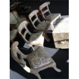 A set of four Iranian mother of pearl inlaid dining chairs of Regency design.